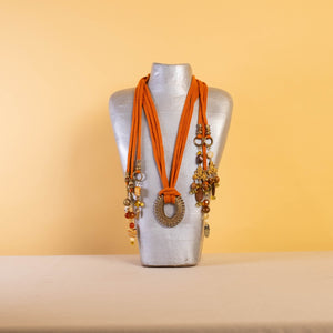 MULTI STRAND NECKLACE Rust with Gold Pendant